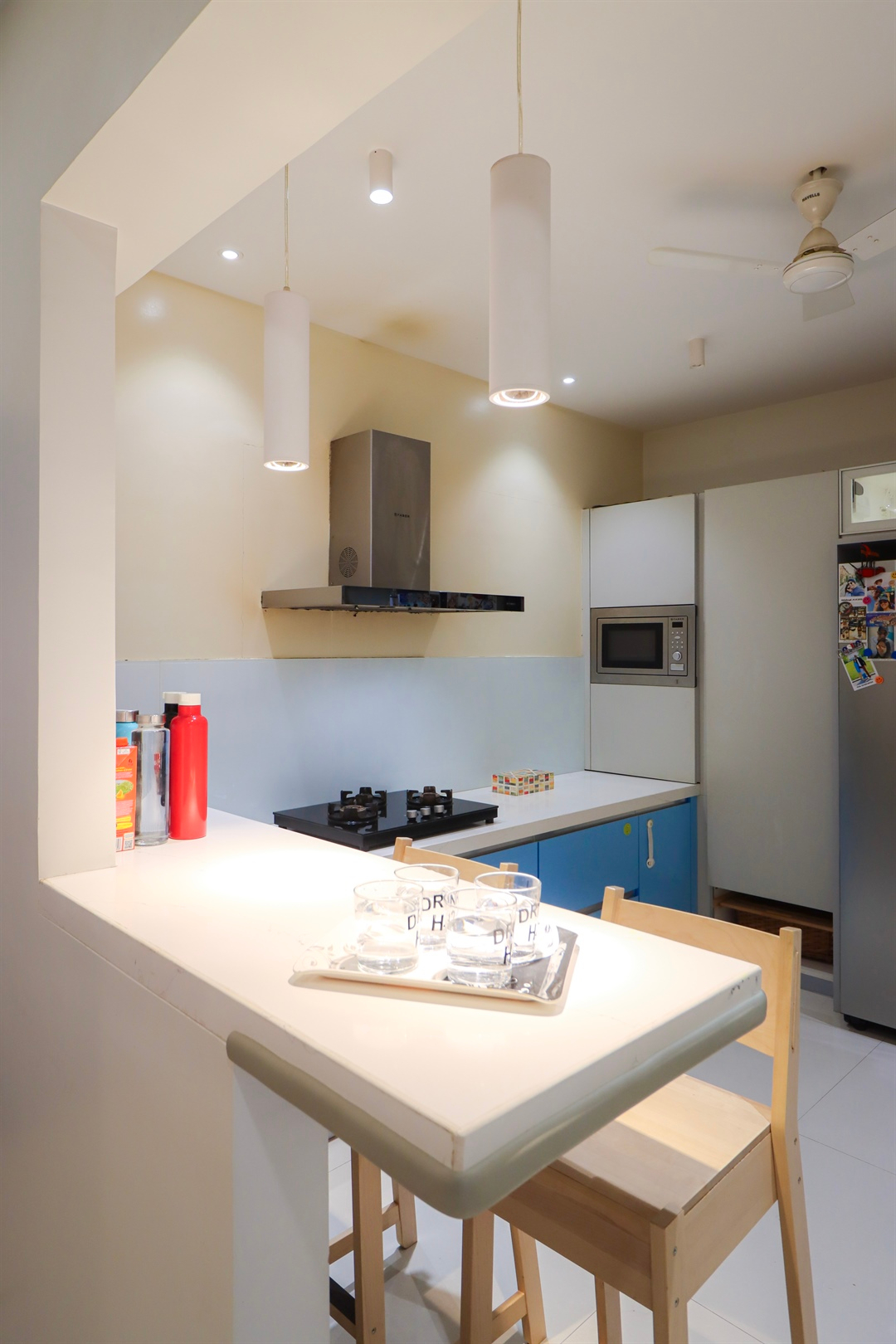 a kitchen with a table and chairs